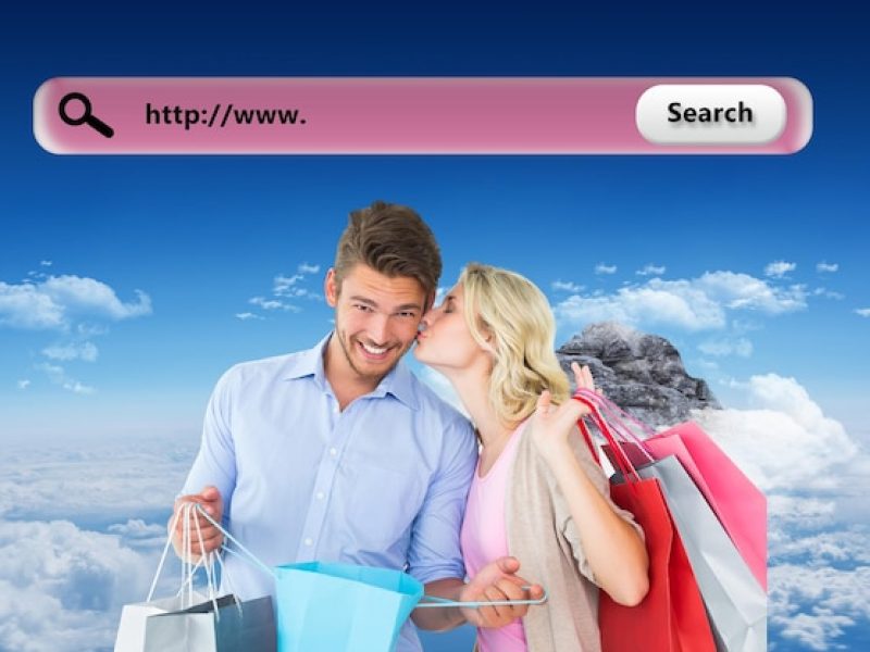 attractive-young-couple-holding-shopping-bags-against-mountain-peak-through-clouds_1134-66104