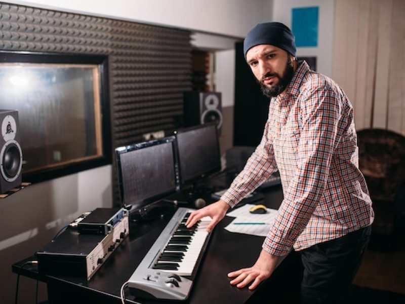 audio-engineering-sound-producer-work-with-music-studio_266732-7854