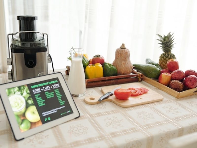 cut-tomato-non-dairy-yogurt-fresh-vegetables-digital-tablet-with-recipe-kitchen-table_274689-23634-1
