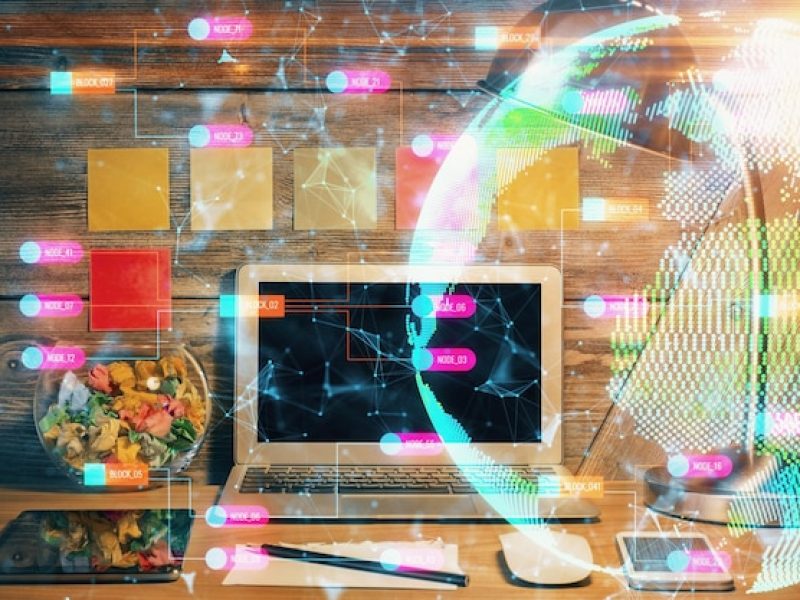 double-exposure-desktop-with-computer-world-map-hologram-international-data-network-concept_700248-81936