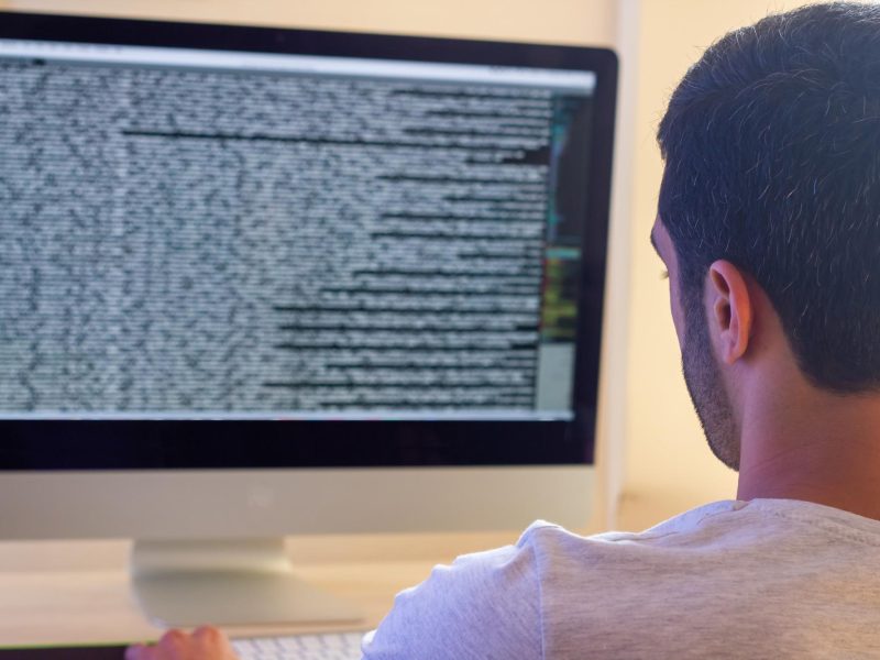 programmer-coding-with-computer-programmer-work_179935-1094