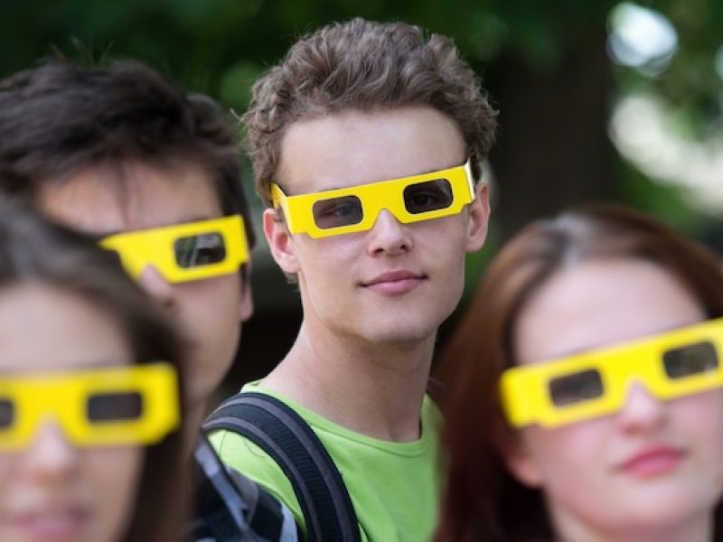 teenage-boy-his-friends-with-3d-glasses_21730-2330